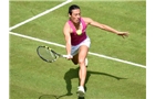 BIRMINGHAM, ENGLAND - JUNE 09:  Francesca Schiavone of Italy returns a shot from Jie Zheng of China on day one of the AEGON Classic Tennis Tournament at Edgbaston Priory Club on June 9, 2014 in Birmingham, England.  (Photo by Tom Dulat/Getty Images)